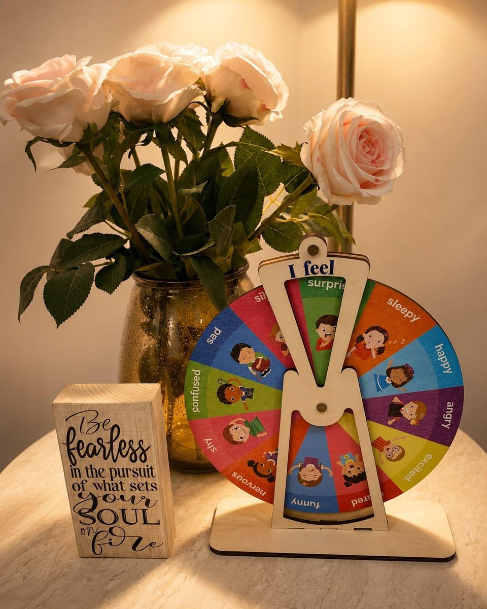 Fresh roses beside a feelings wheel for children